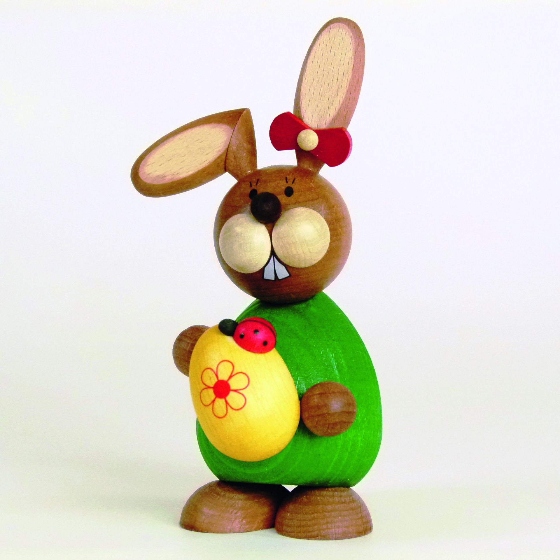Osterhase stehend mit gelben Ei 5,5 cm x 12 cm (B x H) Osterhase stehend mit gelben Ei 5,5 cm x 12 cm (B x H)