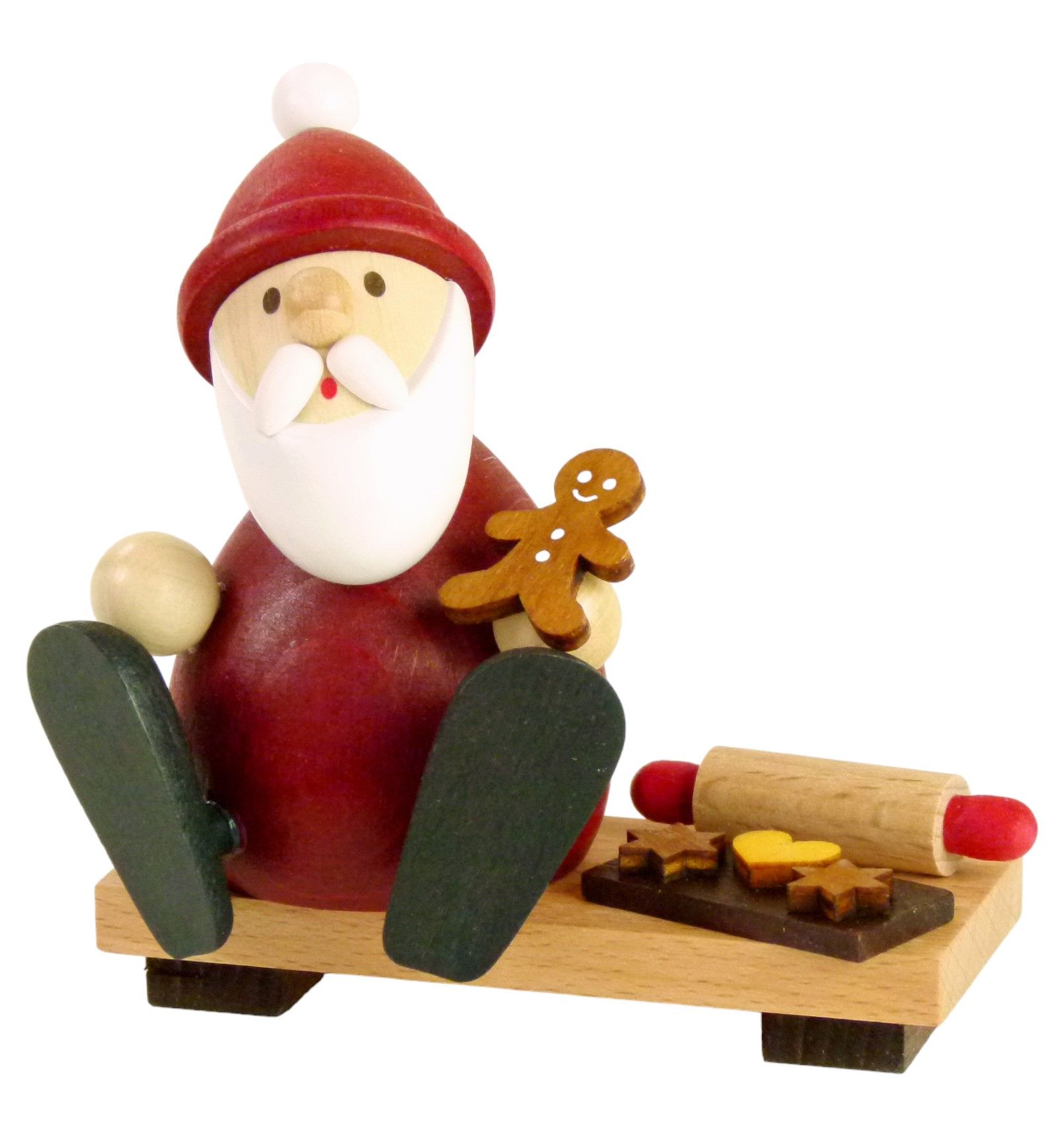 Weihnachtsmann auf Bank mitLebkuchenmann Backblech+Nudelholz