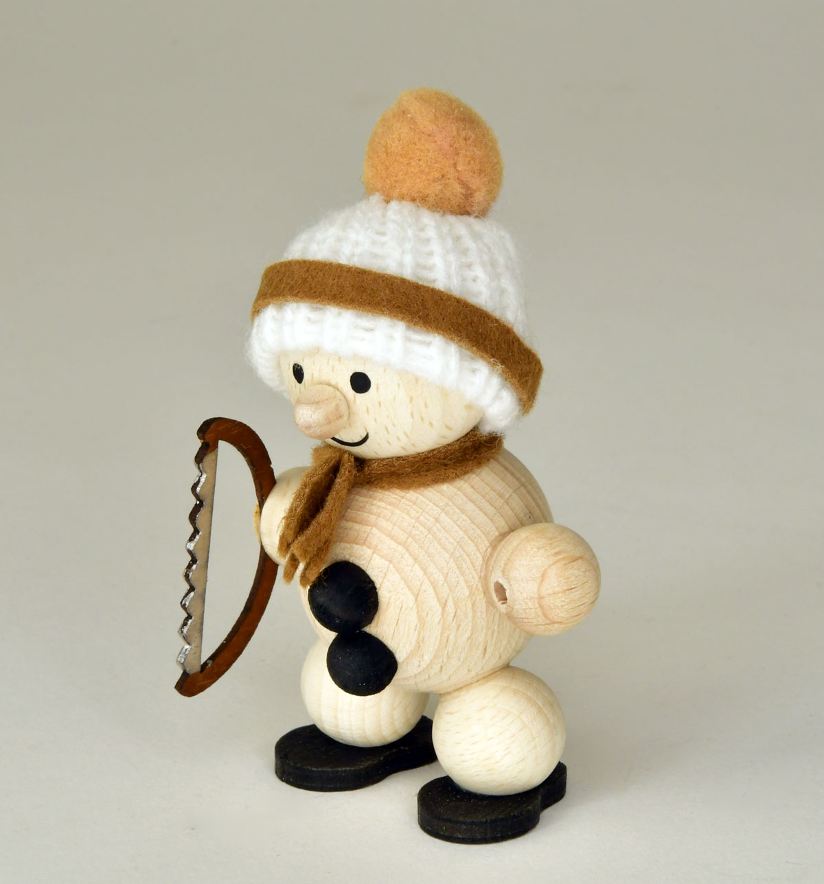 Schneemann, Bügelsäge, brauer Schal Schneemann, Bügelsäge, brauer Schal