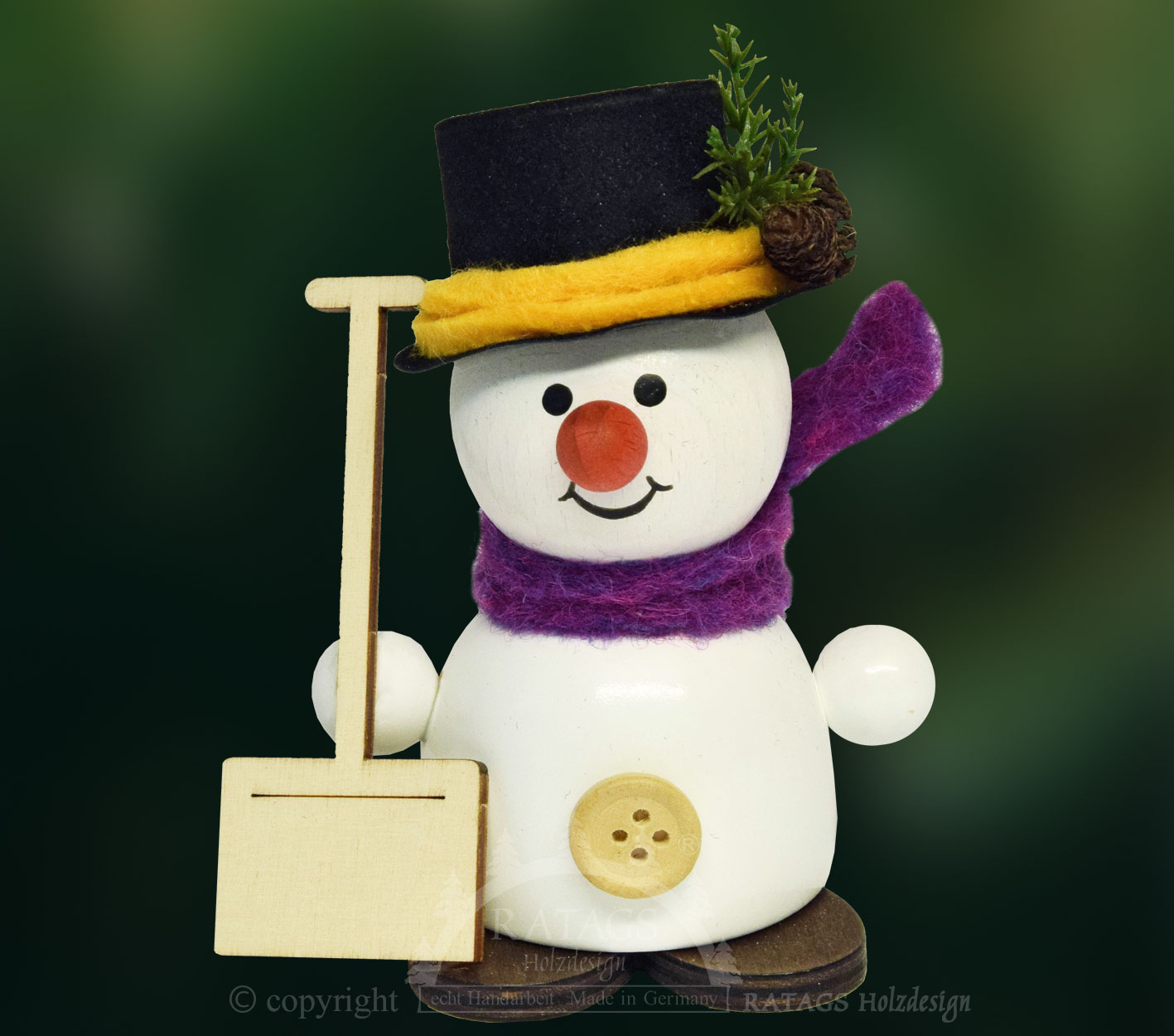 Moppel-Schneemann mit Schneeschieber Moppel-Schneemann mit Schneeschieber