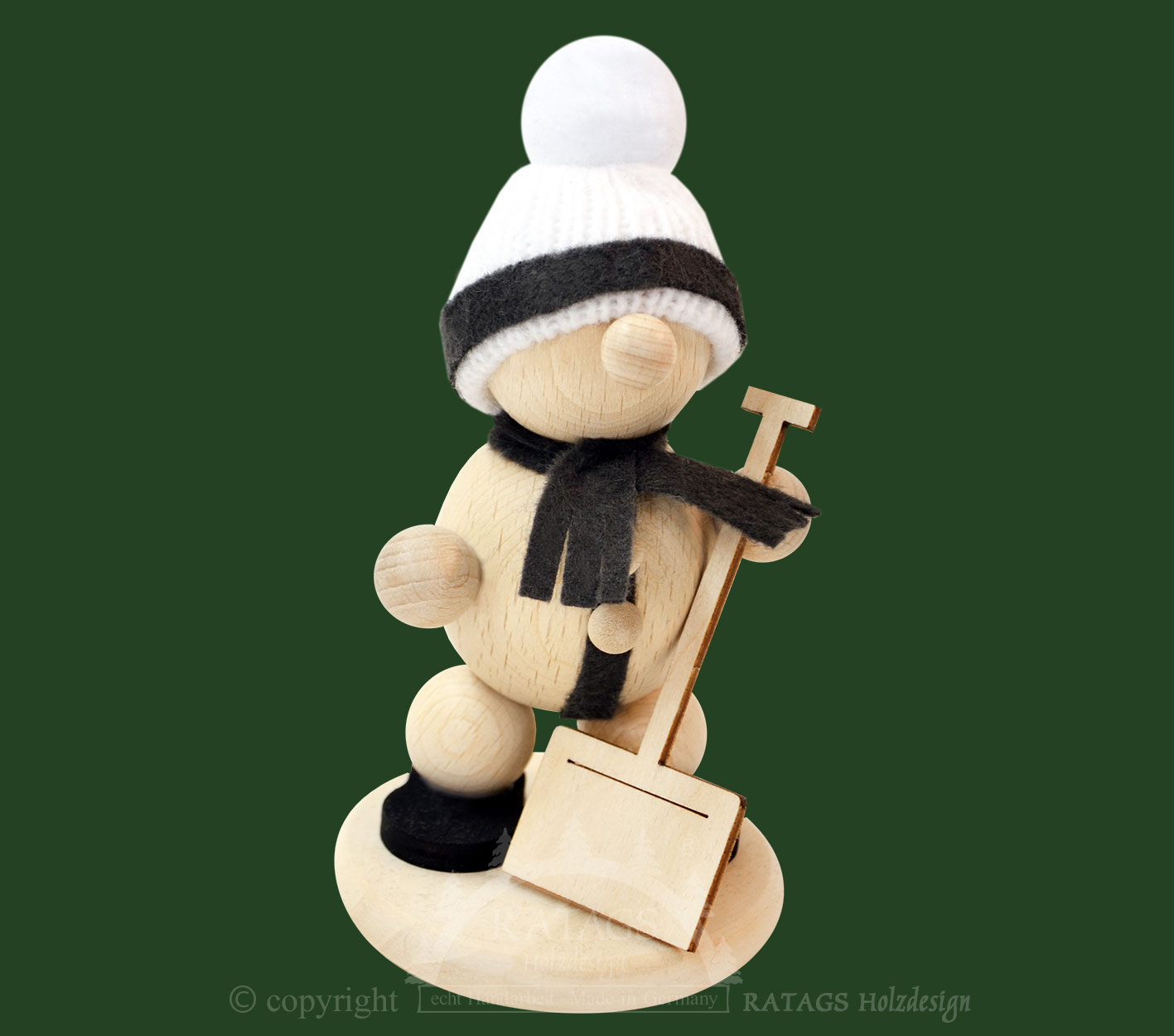Schneemann mit Schneeschieber
