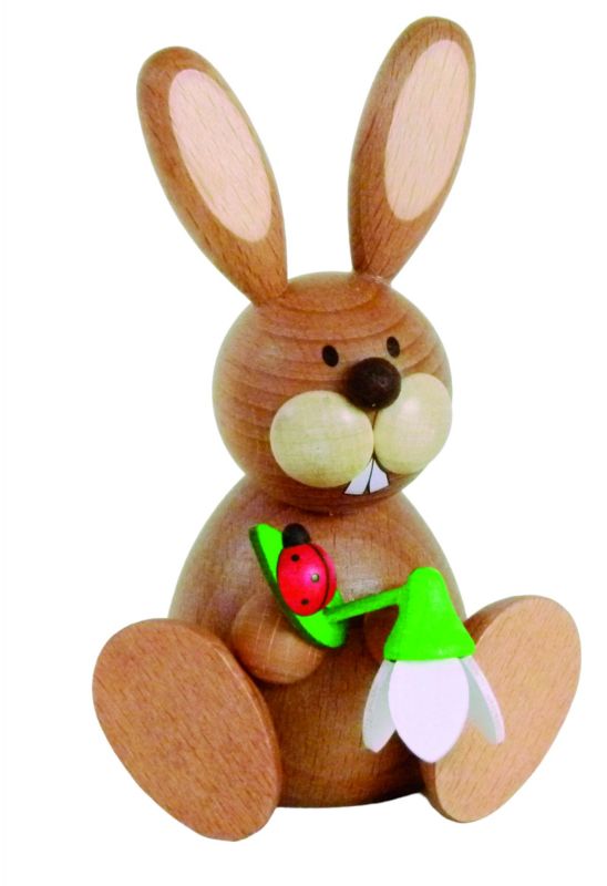 Osterhase sitzend mit Schneeglöckchen 11cm