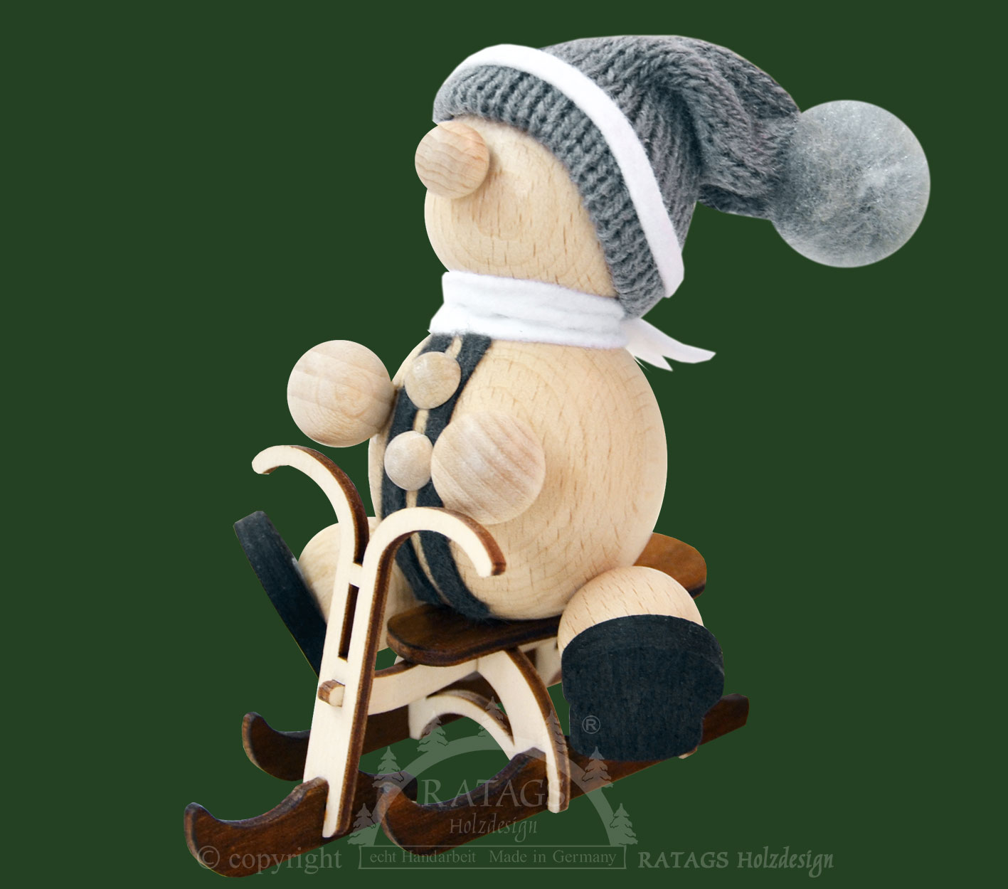 Schneemann auf Skibob Schneemann auf Skibob
