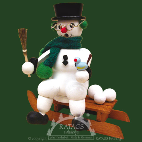Kantenhocker, Schneemann auf Schlitten, Schal grün