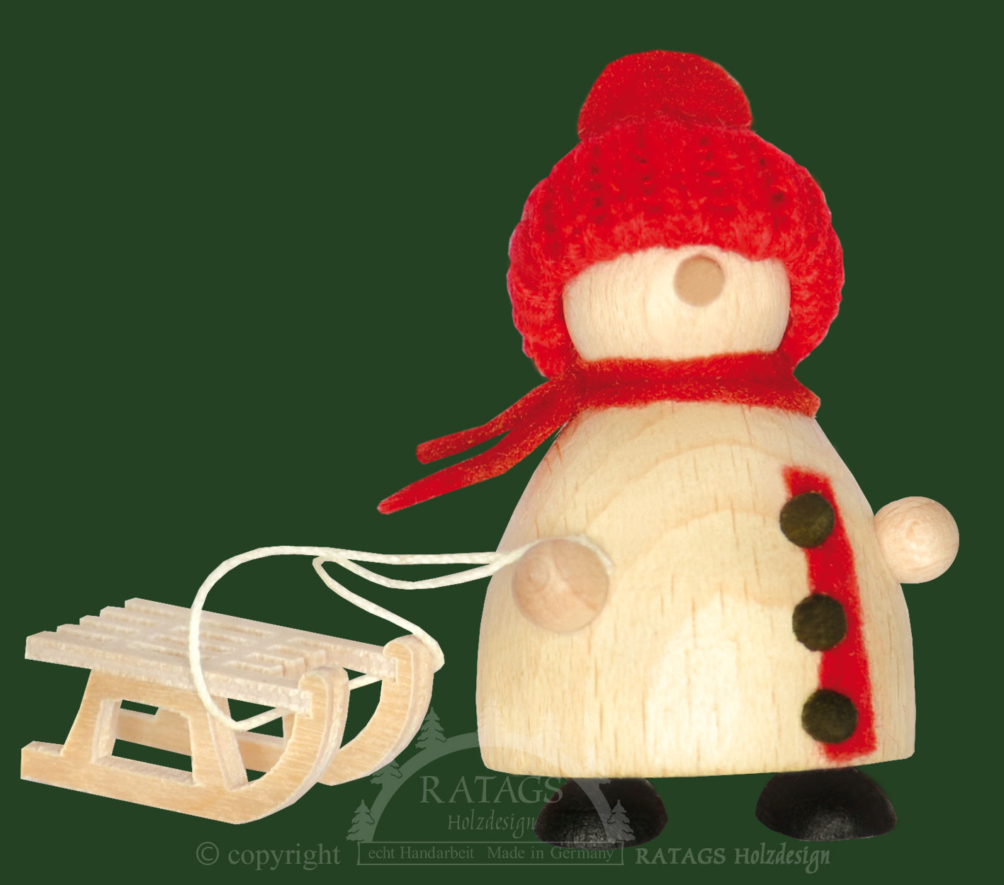 Snow-Molli, Junge Linie, mit Schlitten, rote Strickmütze Snow-Molli, Junge Linie, mit Schlitten, rote Strickmütze
